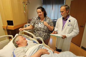 nurse and physician with patient