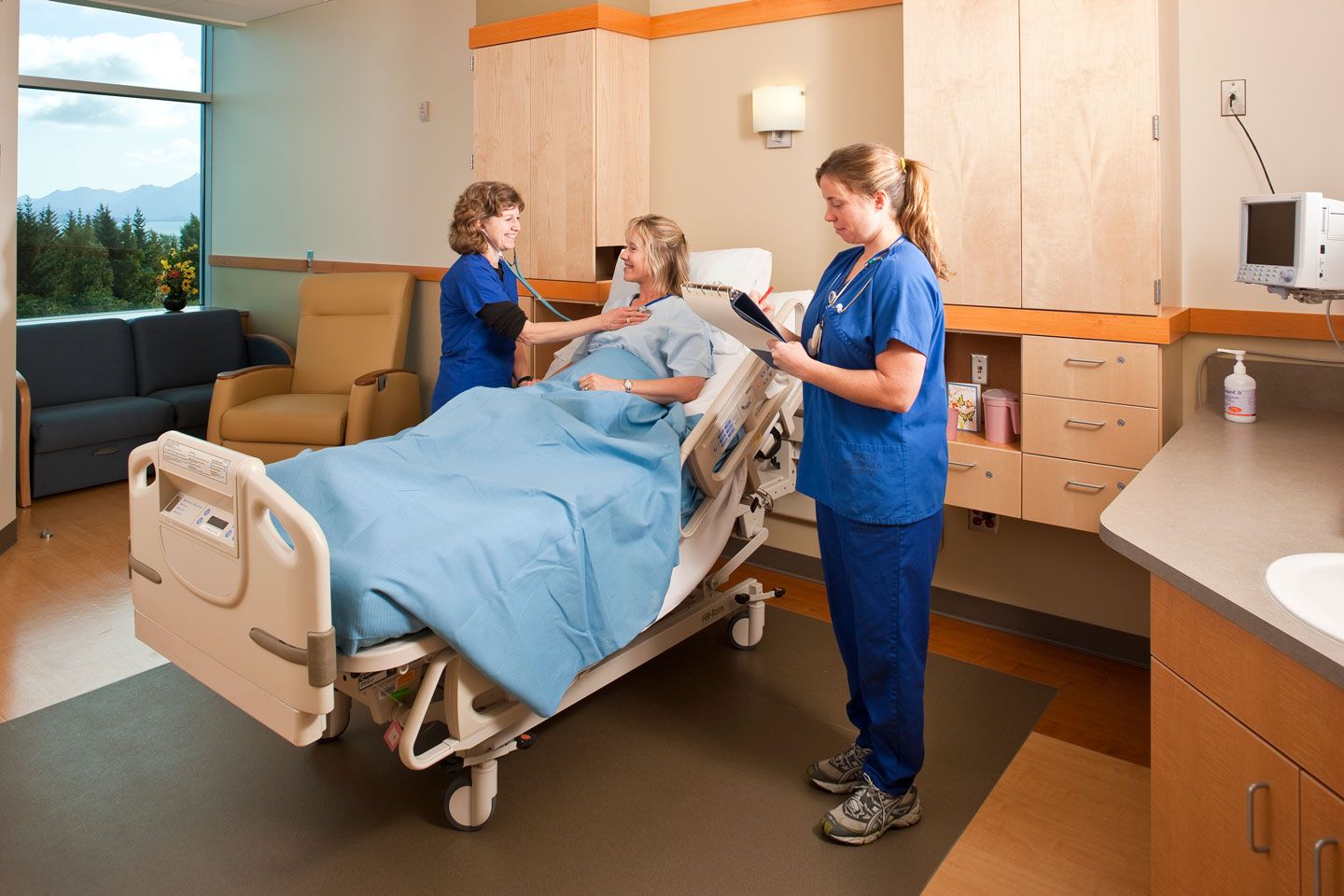 nurses with a patient